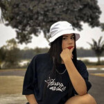 Thalia jovencita en la palma