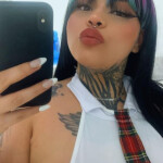 Colombiana tatuada grande